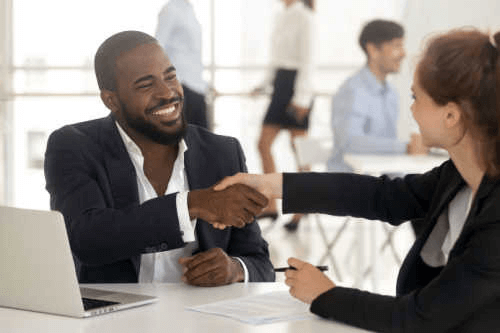 Shaking hands with a loan broker